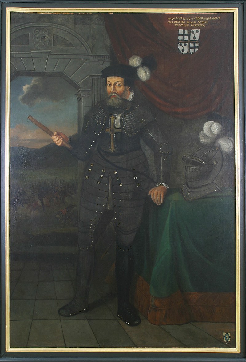 Das Bild zeigt das Porträt des Hochmeisters Wolfgang Schutzbar. Er trägt eine Ritterrüstung und neben ihm liegt ein Ritterhelm. Oben rechts in der Ecke ist das Hochmeisterwappen abgebildet.