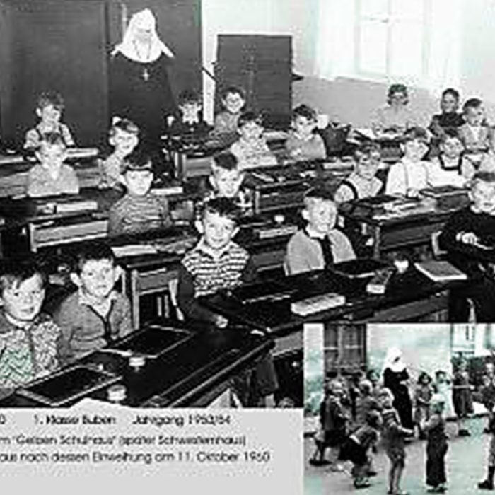 Hier sieht man den Schulunterricht 1960 mit einer Nonne